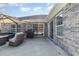 Brick patio with seating area and built-in grill at 3737 Kingsley Dr., Myrtle Beach, SC 29588