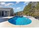 Inviting kidney-shaped pool with lounge chairs at 3737 Kingsley Dr., Myrtle Beach, SC 29588