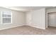 Spacious bedroom with window, closet, and neutral decor at 382 Glacier Way, Conway, SC 29526