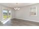 Dining room features hardwood floors and a chandelier at 382 Glacier Way, Conway, SC 29526