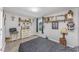 Bedroom with a bed, dresser, and Native American decor at 3845 Woodridge Circle, Little River, SC 29566