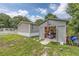 Home's exterior showcases a shed and a well-maintained yard at 3845 Woodridge Circle, Little River, SC 29566