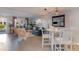 Casual dining area with white table and chairs, near living room at 405 Garden Dr. # 106A, Surfside Beach, SC 29575