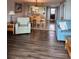 Open concept dining room with table and chairs, view into kitchen and living room at 417 S Dunes Dr., Pawleys Island, SC 29585