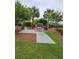 Community picnic area with table, grill, and lush landscaping at 417 S Dunes Dr., Pawleys Island, SC 29585