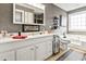 Relaxing bathroom with a soaking tub, double vanity, and tasteful decor at 4323 Lotus Ct. # G, Murrells Inlet, SC 29576