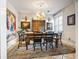 Formal dining room with wood table, chairs, and artwork at 4323 Lotus Ct. # G, Murrells Inlet, SC 29576