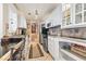 White kitchen with stainless steel appliances and granite countertops at 4323 Lotus Ct. # G, Murrells Inlet, SC 29576