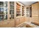 Built-in wooden bookcases and cabinets in a home library at 4323 Lotus Ct. # G, Murrells Inlet, SC 29576