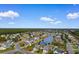 Aerial view of the neighborhood, highlighting the community's layout and pond at 4387 Heartwood Ln., Myrtle Beach, SC 29579