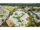 Stunning aerial view of the luxurious community pool and leisure area, surrounded by lush landscaping at 4451 Livorn Loop # 4451, Myrtle Beach, SC 29579