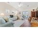 Bright living room featuring a vaulted ceiling, hardwood floors, and sliding glass doors to outdoor space at 4451 Livorn Loop # 4451, Myrtle Beach, SC 29579