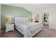 A serene main bedroom featuring a large bed, neutral tones and a walk-in closet at 4451 Livorn Loop # 4451, Myrtle Beach, SC 29579