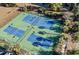 Aerial view of well-maintained tennis courts, perfect for recreation and community engagement at 4451 Livorn Loop # 4451, Myrtle Beach, SC 29579