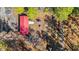 Aerial view of house with red roof and play area at 45 Steve Carmichael Rd., Hemingway, SC 29554