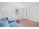 Bedroom with laminate floor, a window, and a built-in closet at 45 Steve Carmichael Rd., Hemingway, SC 29554