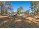 Spacious backyard with playground and playset at 45 Steve Carmichael Rd., Hemingway, SC 29554