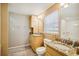 Bathroom with double sinks, granite countertop and large mirror at 4501 S Ocean Blvd., North Myrtle Beach, SC 29582