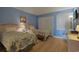 Guest bedroom with two twin beds and ocean view at 4605 S Ocean Blvd. # E-1, North Myrtle Beach, SC 29582