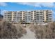 Building exterior with beach access at 4605 S Ocean Blvd. # E-1, North Myrtle Beach, SC 29582