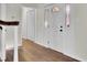 Bright hallway with hardwood floors and white doors at 47 Byers Trail, Pawleys Island, SC 29585