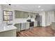 Modern kitchen with stainless steel appliances and quartz countertops at 47 Byers Trail, Pawleys Island, SC 29585