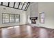 Living room with vaulted ceiling, fireplace, and hardwood floors at 47 Byers Trail, Pawleys Island, SC 29585