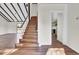 Wooden staircase leading to the upper level of the home at 47 Byers Trail, Pawleys Island, SC 29585