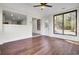 Bright sunroom features hardwood floors and backyard access at 47 Byers Trail, Pawleys Island, SC 29585