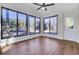 Sunroom with hardwood floors and sliding glass doors at 47 Byers Trail, Pawleys Island, SC 29585