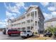 Another view of the building's exterior, highlighting its architectural style at 4781 Wild Iris Dr. # 304, Myrtle Beach, SC 29577