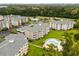 Complex of apartment buildings with a pool and green space at 4894 Luster Leaf Circle # 402, Myrtle Beach, SC 29577