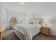 Spacious main bedroom with bay window and en-suite bathroom at 4894 Luster Leaf Circle # 402, Myrtle Beach, SC 29577