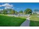 Relaxing community pool with lounge chairs and walkway at 4894 Luster Leaf Circle # 402, Myrtle Beach, SC 29577