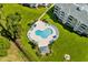 Community pool with plenty of lounge chairs at 4894 Luster Leaf Circle # 402, Myrtle Beach, SC 29577