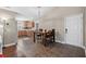 Kitchen and dining area with tiled floors and wooden table at 518 Cordgrass Ln., Little River, SC 29566