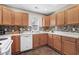 Nice kitchen with light wood cabinets, tile backsplash, and modern appliances at 518 Cordgrass Ln., Little River, SC 29566