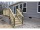 Wooden deck and stairs leading to the ground next to the house at 5225 Hwy 712, Galivants Ferry, SC 29544