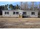 Gray vinyl siding house with wooden steps and a small yard at 5225 Hwy 712, Galivants Ferry, SC 29544