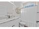 Bathroom with white vanity, granite countertop, and shower/tub combo at 5300 Juniper Bay Rd., Conway, SC 29527