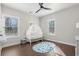 Bedroom with crib, changing table, and neutral decor at 5300 Juniper Bay Rd., Conway, SC 29527