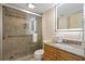 Bathroom with a shower and granite vanity at 5308 N Ocean Blvd. # 601, Myrtle Beach, SC 29577