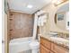 Bathroom with tub shower combo and granite vanity at 5308 N Ocean Blvd. # 701, Myrtle Beach, SC 29577