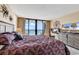 Ocean view bedroom with king-size bed and TV at 5308 N Ocean Blvd. # 701, Myrtle Beach, SC 29577