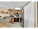 Well-equipped kitchen featuring granite countertops and stainless steel appliances at 5308 N Ocean Blvd. # 701, Myrtle Beach, SC 29577