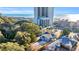 Aerial view of a light blue house near the beach and high-rises at 5515 Porcher Dr., Myrtle Beach, SC 29577