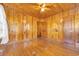 Bedroom with hardwood floors and wood walls at 5515 Porcher Dr., Myrtle Beach, SC 29577