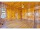 Bedroom with hardwood floors and wood walls at 5515 Porcher Dr., Myrtle Beach, SC 29577