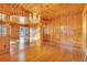 Large dining room with hardwood floors and a crystal chandelier at 5515 Porcher Dr., Myrtle Beach, SC 29577