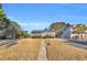 Brick ranch house with screened porch and landscaped yard at 5515 Porcher Dr., Myrtle Beach, SC 29577